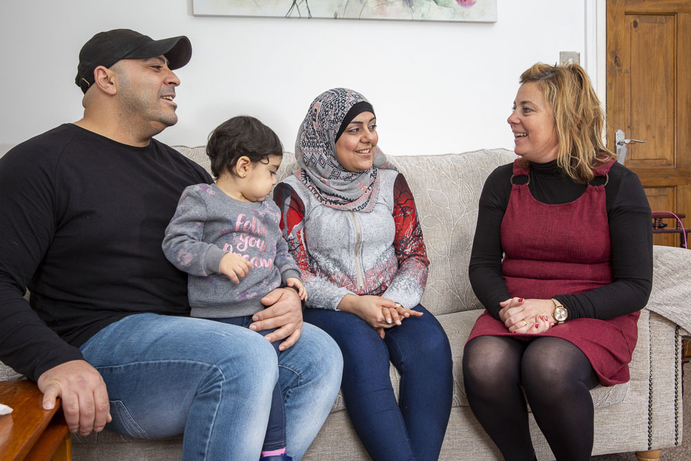 image of volunteer with parents